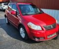 Красный Сузуки СХ4, объемом двигателя 2 л и пробегом 83 тыс. км за 5100 $, фото 2 на Automoto.ua