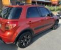 Червоний Сузукі СХ4, об'ємом двигуна 1.59 л та пробігом 161 тис. км за 9000 $, фото 2 на Automoto.ua