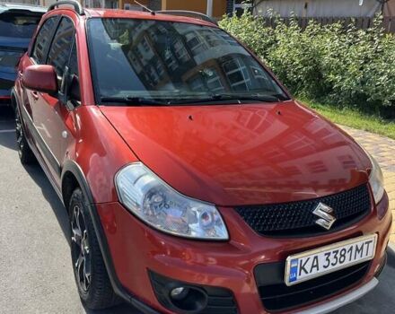 Червоний Сузукі СХ4, об'ємом двигуна 1.59 л та пробігом 161 тис. км за 9000 $, фото 1 на Automoto.ua