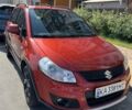 Червоний Сузукі СХ4, об'ємом двигуна 1.59 л та пробігом 161 тис. км за 9000 $, фото 1 на Automoto.ua