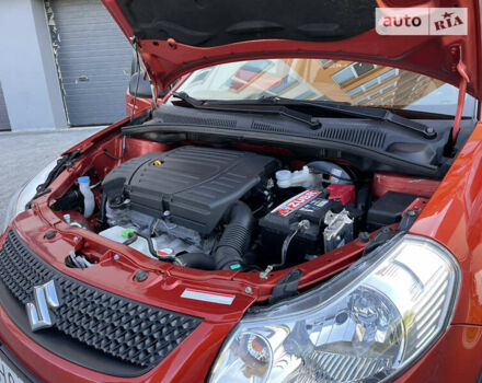Красный Сузуки СХ4, объемом двигателя 1.6 л и пробегом 63 тыс. км за 11600 $, фото 95 на Automoto.ua