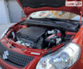 Красный Сузуки СХ4, объемом двигателя 1.6 л и пробегом 63 тыс. км за 11600 $, фото 95 на Automoto.ua