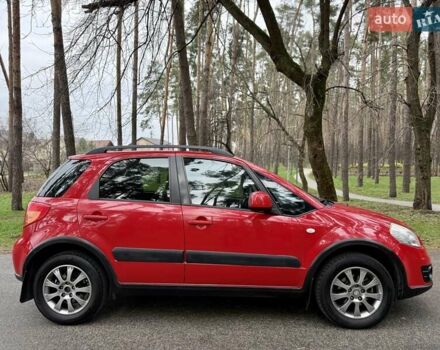 Красный Сузуки СХ4, объемом двигателя 1.6 л и пробегом 167 тыс. км за 10750 $, фото 3 на Automoto.ua