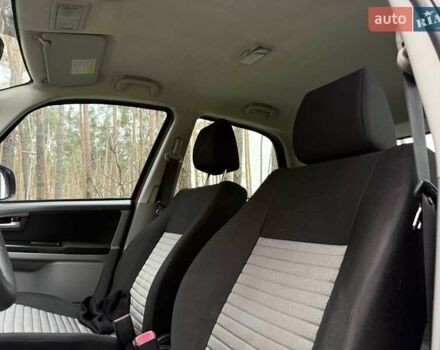 Червоний Сузукі СХ4, об'ємом двигуна 1.6 л та пробігом 167 тис. км за 10750 $, фото 13 на Automoto.ua