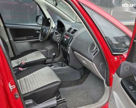 Червоний Сузукі СХ4, об'ємом двигуна 1.6 л та пробігом 167 тис. км за 10900 $, фото 9 на Automoto.ua
