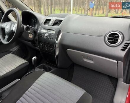 Червоний Сузукі СХ4, об'ємом двигуна 1.6 л та пробігом 167 тис. км за 10750 $, фото 19 на Automoto.ua