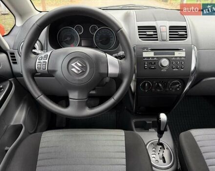 Червоний Сузукі СХ4, об'ємом двигуна 1.6 л та пробігом 167 тис. км за 10750 $, фото 26 на Automoto.ua