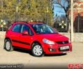Красный Сузуки СХ4, объемом двигателя 1.6 л и пробегом 199 тыс. км за 8850 $, фото 1 на Automoto.ua
