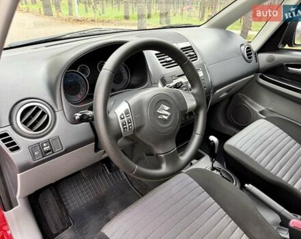 Червоний Сузукі СХ4, об'ємом двигуна 1.6 л та пробігом 167 тис. км за 10599 $, фото 18 на Automoto.ua