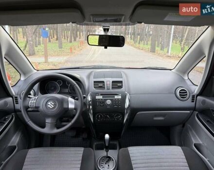 Червоний Сузукі СХ4, об'ємом двигуна 1.6 л та пробігом 167 тис. км за 10750 $, фото 10 на Automoto.ua