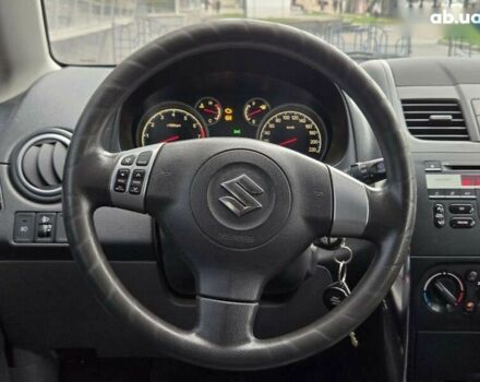 Червоний Сузукі СХ4, об'ємом двигуна 1.6 л та пробігом 167 тис. км за 10900 $, фото 20 на Automoto.ua