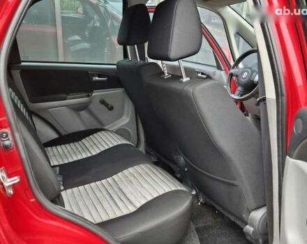 Червоний Сузукі СХ4, об'ємом двигуна 1.6 л та пробігом 167 тис. км за 10900 $, фото 12 на Automoto.ua