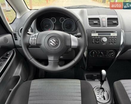 Червоний Сузукі СХ4, об'ємом двигуна 1.6 л та пробігом 167 тис. км за 10599 $, фото 16 на Automoto.ua