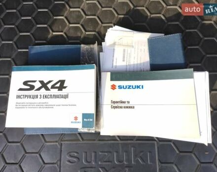 Красный Сузуки СХ4, объемом двигателя 1.59 л и пробегом 109 тыс. км за 15500 $, фото 5 на Automoto.ua