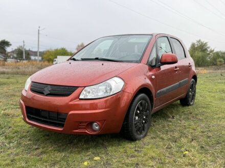 Красный Сузуки СХ4, объемом двигателя 1.6 л и пробегом 235 тыс. км за 3200 $, фото 1 на Automoto.ua