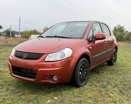 Красный Сузуки СХ4, объемом двигателя 1.6 л и пробегом 235 тыс. км за 3200 $, фото 1 на Automoto.ua