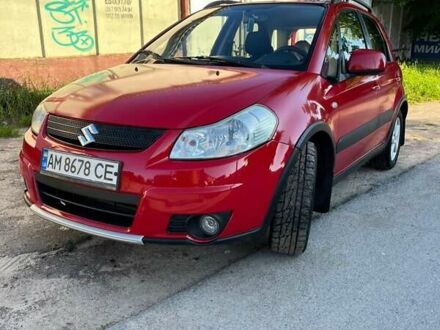 Красный Сузуки СХ4, объемом двигателя 1.6 л и пробегом 233 тыс. км за 5300 $, фото 1 на Automoto.ua
