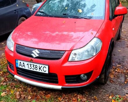 Красный Сузуки СХ4, объемом двигателя 1.6 л и пробегом 230 тыс. км за 5500 $, фото 1 на Automoto.ua