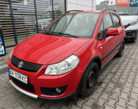 Красный Сузуки СХ4, объемом двигателя 1.59 л и пробегом 232 тыс. км за 7300 $, фото 1 на Automoto.ua