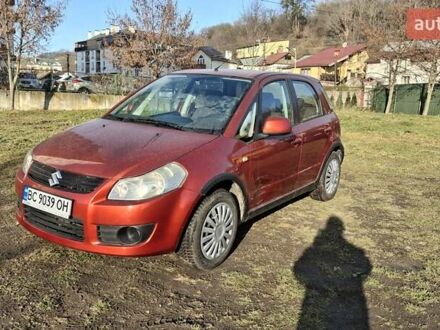 Красный Сузуки СХ4, объемом двигателя 1.5 л и пробегом 123 тыс. км за 4300 $, фото 1 на Automoto.ua