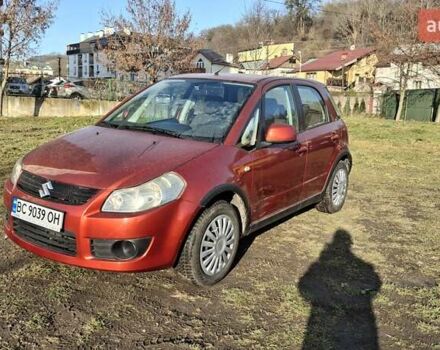Красный Сузуки СХ4, объемом двигателя 1.5 л и пробегом 123 тыс. км за 4300 $, фото 1 на Automoto.ua