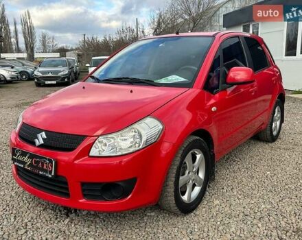 Красный Сузуки СХ4, объемом двигателя 1.6 л и пробегом 183 тыс. км за 6500 $, фото 1 на Automoto.ua