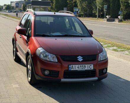 Красный Сузуки СХ4, объемом двигателя 1.6 л и пробегом 203 тыс. км за 6925 $, фото 1 на Automoto.ua
