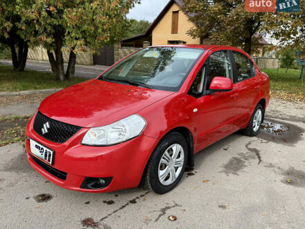 Красный Сузуки СХ4, объемом двигателя 1.6 л и пробегом 181 тыс. км за 6200 $, фото 1 на Automoto.ua