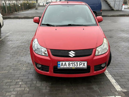 Красный Сузуки СХ4, объемом двигателя 1.59 л и пробегом 200 тыс. км за 5500 $, фото 1 на Automoto.ua