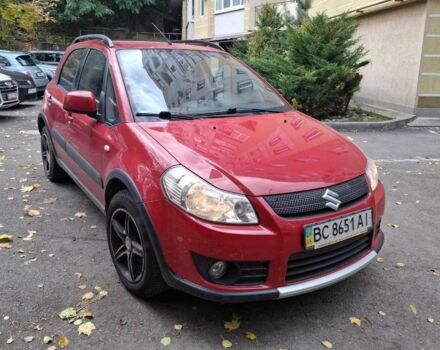 Красный Сузуки СХ4, объемом двигателя 1.59 л и пробегом 86 тыс. км за 8000 $, фото 1 на Automoto.ua