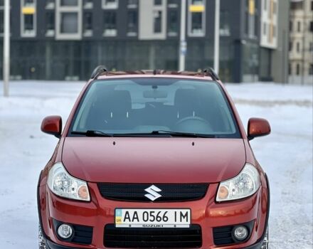 Красный Сузуки СХ4, объемом двигателя 1.6 л и пробегом 215 тыс. км за 7500 $, фото 1 на Automoto.ua