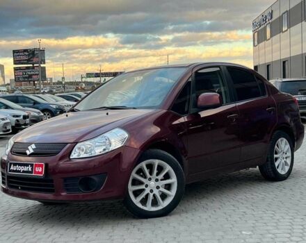 Красный Сузуки СХ4, объемом двигателя 2 л и пробегом 231 тыс. км за 5190 $, фото 1 на Automoto.ua