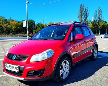 Красный Сузуки СХ4, объемом двигателя 1.6 л и пробегом 166 тыс. км за 7500 $, фото 1 на Automoto.ua
