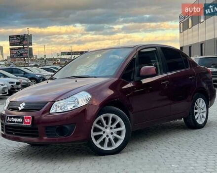 Красный Сузуки СХ4, объемом двигателя 2 л и пробегом 231 тыс. км за 5190 $, фото 1 на Automoto.ua