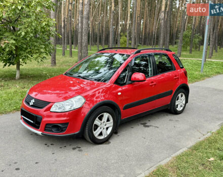 Красный Сузуки СХ4, объемом двигателя 1.6 л и пробегом 166 тыс. км за 9000 $, фото 1 на Automoto.ua