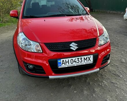 Красный Сузуки СХ4, объемом двигателя 1.6 л и пробегом 82 тыс. км за 7500 $, фото 1 на Automoto.ua