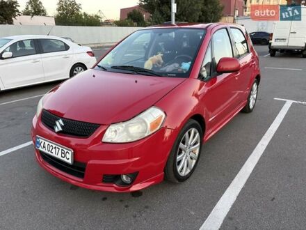 Красный Сузуки СХ4, объемом двигателя 2 л и пробегом 170 тыс. км за 8900 $, фото 1 на Automoto.ua