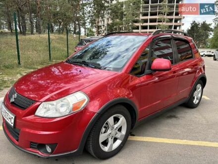 Красный Сузуки СХ4, объемом двигателя 2 л и пробегом 300 тыс. км за 10000 $, фото 1 на Automoto.ua