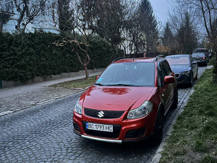 Красный Сузуки СХ4, объемом двигателя 1.6 л и пробегом 159 тыс. км за 8500 $, фото 1 на Automoto.ua