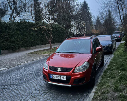 Красный Сузуки СХ4, объемом двигателя 1.6 л и пробегом 159 тыс. км за 8500 $, фото 1 на Automoto.ua