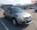 Серый Сузуки СХ4, объемом двигателя 1.6 л и пробегом 300 тыс. км за 5700 $, фото 1 на Automoto.ua