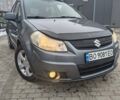 Серый Сузуки СХ4, объемом двигателя 1.6 л и пробегом 243 тыс. км за 5000 $, фото 1 на Automoto.ua