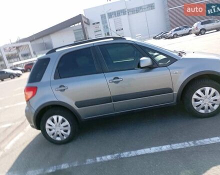 Серый Сузуки СХ4, объемом двигателя 1.6 л и пробегом 300 тыс. км за 5700 $, фото 2 на Automoto.ua
