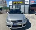 Серый Сузуки СХ4, объемом двигателя 1.9 л и пробегом 248 тыс. км за 5050 $, фото 1 на Automoto.ua