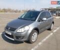 Серый Сузуки СХ4, объемом двигателя 1.6 л и пробегом 300 тыс. км за 5700 $, фото 1 на Automoto.ua