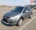 Серый Сузуки СХ4, объемом двигателя 1.6 л и пробегом 308 тыс. км за 6000 $, фото 1 на Automoto.ua