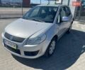 Серый Сузуки СХ4, объемом двигателя 1.9 л и пробегом 248 тыс. км за 5050 $, фото 1 на Automoto.ua