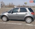 Серый Сузуки СХ4, объемом двигателя 1.6 л и пробегом 300 тыс. км за 5700 $, фото 5 на Automoto.ua