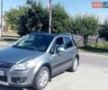 Серый Сузуки СХ4, объемом двигателя 1.4 л и пробегом 242 тыс. км за 7000 $, фото 1 на Automoto.ua