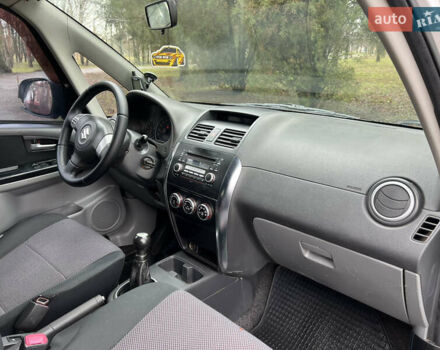 Серый Сузуки СХ4, объемом двигателя 1.59 л и пробегом 209 тыс. км за 5150 $, фото 25 на Automoto.ua